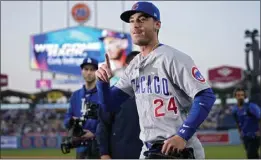  ?? MARK J. TERRILL – THE ASSOCIATED PRESS ?? Former Dodger Cody Bellinger gestures to the crowd Friday in his return to Los Angeles.