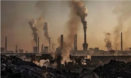  ?? ?? Smoke billows from a large steel plant in Inner Mongolia, China. Photograph: Kevin Frayer/Getty Images