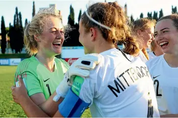  ?? GETTY IMAGES ?? Anna Leat (left) and Aneka Mittendorf­f celebrate after New Zealand beat Japan on penalty kicks during the Fifa under-17 women’s World Cup in Uruguay.