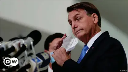  ??  ?? President Jair Bolsonaro has been criticized for his reluctance to take tough measures against the spread of coronaviru­s