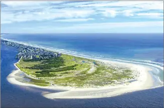  ??  ?? You can live on beautiful Topsail Island, North Carolina if you buy restaurant Santino’s Pizza & More.