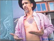  ??  ?? June 15, 2015: Master tenant Derick Almena answers questions from an Oakland police officer about a reported stabbing that occurred at the Ghost Ship.