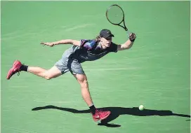  ?? AP ?? Denis Shapovalov returns a shot at the US Open.