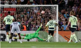  ?? ?? Manchester City's Riyad Mahrez fires a penalty into the top corner. Photograph: Nacho Doce/Reuters