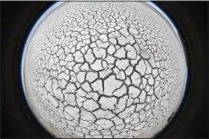  ?? (AP) ?? In this photograph created by a fisheye lens shows cracked mud at the Great Salt Lake on April 25, 2021, near Antelope Island, Utah. The lake in Utah has been shrinking for years, and a drought gripping the American West could make this year the worst yet.