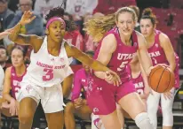  ?? DARRYL WEBB/ASSOCIATED PRESS FILE PHOTO ?? Utah’s Gianna Kneepkens, right, drives the baseline against Arizona State’s Tyi Skinner during the second half of a Feb. 19 game in Tempe, Ariz.