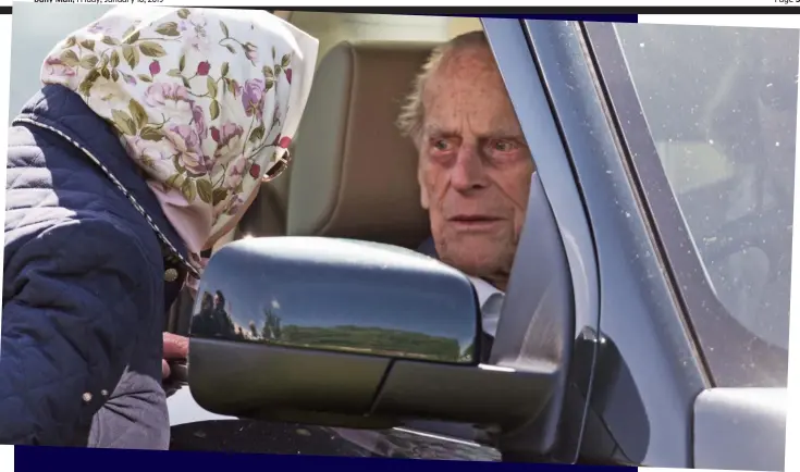  ??  ?? In control: The Queen talking to Prince Philip at the wheel