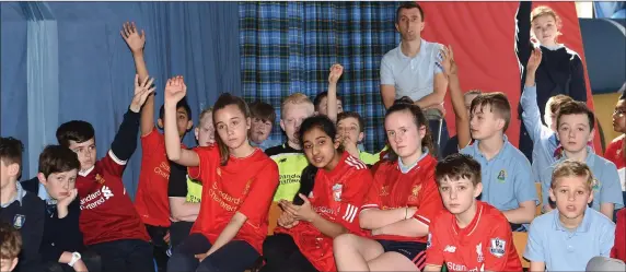  ??  ?? Former Liverpool and England star Jamie Carragher taking questions from the pupils at St Oliver’s National School, Killarney on Friday.Photo by Michelle Cooper Galvin