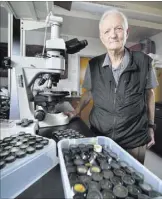  ?? Bill Hughes Las Vegas Review-Journal ?? Eugene Smith, professor emeritus of geology at UNLV, is founder of the cryptoteph­ra lab, which is dedicated to the study of microscopi­c volcanic ash shards with the goal of learning more about ancient volcanic eruptions.