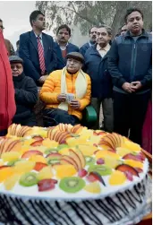  ?? — PTI ?? Union finance minister Arun Jaitley celebrates his 65th birthday with his fellow morning walkers at Lodhi Garden in New Delhi on Thursday.