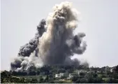  ?? AFP ?? Smoke rises during Israeli bombardmen­t on the village of Alma Al-Shaab in south Lebanon on Thursday.