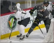  ?? Las Vegas Review-journal @Heidifang ?? Heidi Fang
Forward Tomas Jurco (13) tries to skate around defenseman Carl Dahlstrom during Golden Knights training camp at City National Arena on Wednesday.