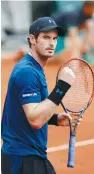  ?? (Reuters) ?? ANDY MURRAY celebrates during his 7-6 (8), 7-5, 6-0 win against Juan Martin Del Potro in the third round of the French Open yesterday.