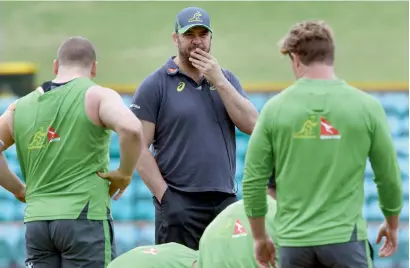  ?? AFP file ?? Australian coach Michael Cheika speaking to his players during a training session. —