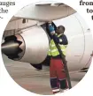  ?? 2015 PHOTO BY TONY GUTIERREZ, AP ?? A worker refuels a plane at Dallas-Fort Worth airport.