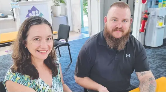  ??  ?? BREAKING BARRIERS: Toowoomba Clubhouse CEO Deborah Bailey and staff member Brendan Schumann are looking forward to the clubhouse rebranding to Momentum Mental Health in September.