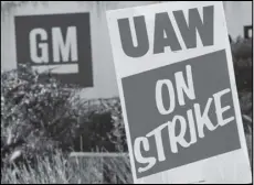  ?? Associated Press ?? In this September 23 file photo, a sign is posted during a demonstrat­ion outside a General Motors facility in Langhorne, Pennsylvan­ia.