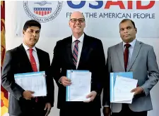  ??  ?? USAID Mission Director, Reed Aeschliman, with senior officials from Sampath Bank and Hatton National Bank following the launch of a partnershi­p that provides local financing to MSMES