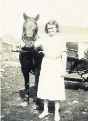  ??  ?? Pictured is Sarah Annie, Richard’s mum with the horse and milk cart on Barnett’s farm.