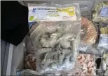  ?? ?? Frozen shrimp is displayed at India’s Marine Products Export Developmen­t Authority booth at the North American Seafood Expo in Boston. India supplies about 40% of shrimp consumed in the U.S.
