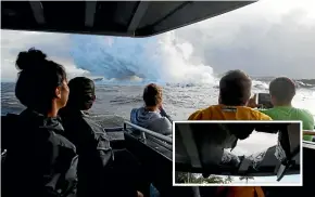  ?? AP ?? Tourists watching lava enter the ocean off Hawaii’s Big Island were injured when their boat was struck by a lava bomb causing damage (inset).