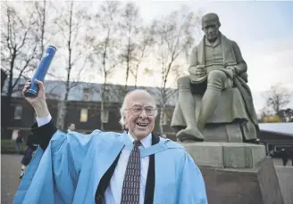  ?? PICTURE: JEFF J MITCHELL/GETTY IMAGES ?? The late Professor Peter Higgs in front of a statue of James Watt in 2012