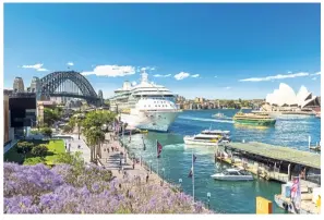  ??  ?? Jacaranda galore at the Circular Quay and Sydney Harbour.