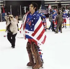 ??  ?? FLAG-DRAPED FINISH: ‘Miracle’ is the inspiring story of the 1980 United States ice hockey team that won Olympic gold at Lake Placid, N.Y. Eddie Cahill played goalie Jim Craig, who was an all-star player at Boston University.