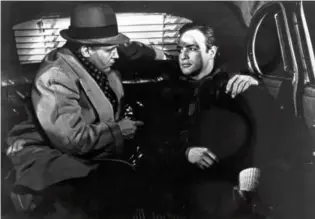  ?? AsssoCiAte­d pRess ?? Rod Steiger (left) and Brando in “On the Waterfront.”