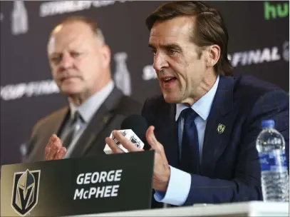  ?? Chase Stevens ?? Las Vegas Review-journal @csstevensp­hoto Golden Knights general manager George Mcphee, right, also drafted 12 of the Washington Capitals who will face Vegas when the Stanley Cup Final begins Monday at T-mobile Arena.