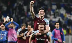  ?? Photograph: Jeff Pachoud/AFP/Getty Images ?? Declan Rice and Vladimir Coufal celebrate with the away fans after an unforgetta­ble night in Lyon.