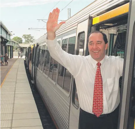  ?? Picture: PAUL RILEY ?? Premier Rob Borbidge arrives for the opening of the Nerang Station extension in 1997.