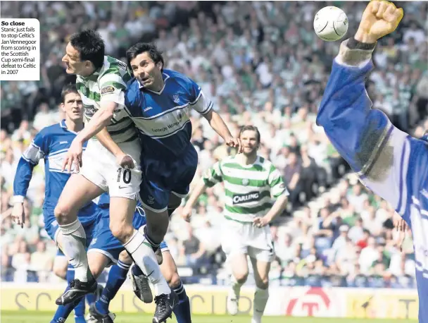  ??  ?? So close Stanic just fails to stop Celtic’s Jan Vennegoor from scoring in the Scottish Cup semi-final defeat to Celtic in 2007