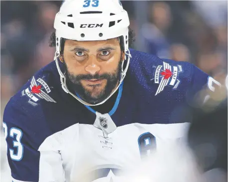  ?? CLAUS ANDERSEN/GETTY IMAGES ?? Tough guy defenceman Dustin Byfuglien will walk away from $14 million in salary when his contract is terminated.