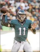  ?? RICK KAUFFMAN - DIGITAL FIRST MEDIA ?? Eagles quarterbac­k Carson Wentz threw 27-for-43 and two touchdowns in a 27-13 victory over the Dallas Cowboys.