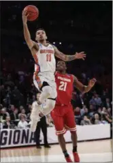  ?? FRANK FRANKLIN II — ASSOCIATED PRESS ?? Florida’s Chris Chiozza soars to basket during Gators’ East Regional semifinal victory over Wisconsin.