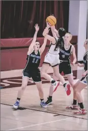  ?? PHOTO COURTESY ANDREW YEPEZ ?? Calexico high Bulldog Cecilia Costa (2, center) attempts a shot against West Hills during a CIF SDS D-III opening round girls basketball game on Wednesday, February 15, at Varner Gym in Calexico.