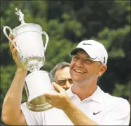  ?? Morry Gash / Associated Press ?? Lucas Glover holds his trophy after winning the U.S. Open at Bethpage in Farmingdal­e, N.Y., in 2009. The COVID-19 pandemic, which already has postponed the U.S. Open from June to September, has forced the USGA to do away with qualifying for the first time since 1924.