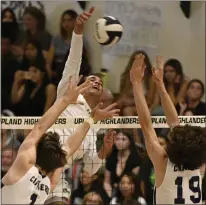  ?? WILL LESTER – STAFF PHOTOGRAPH­ER ?? Upland’s Jordan Lucas spikes the ball Wednesday past Dos Pueblos defenders Reid Sisney, left, and Ewan Gilner during their playoff match.