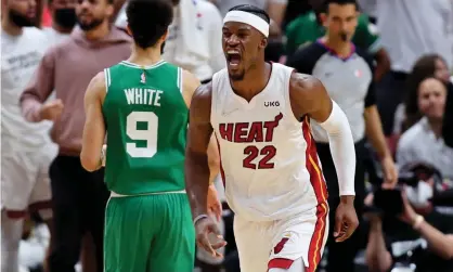  ?? Photograph: Michael Reaves/Getty Images ?? Miami Heat forward Jimmy Butler (22) celebrates a basket during the third quarter of Tuesday night’s Game 1 of the East finals.