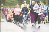  ?? Bryan Haeffele / Hearst Connecticu­t Media ?? The 12th annual Run Like a Mother 5K took place on a rainy Mother’s Day this year. The event was originally started by Ridgefield resident Megan Searfoss.