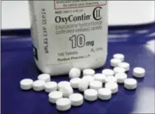  ?? AP PHOTO/TOBY TALBOT ?? This file photo shows OxyContin pills.