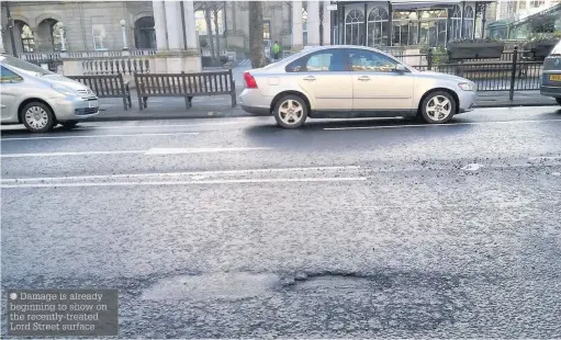  ??  ?? Damage is already beginning to show on the recently- treated Lord Street surface