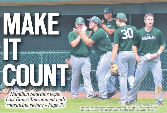  ?? KYLE FRANKO — TRENTONIAN PHOTO ?? Hamilton Spartans players celebrate after scoring a run against Mercer Stars during a Last Dance Tournament game at Gilder Park in Bordentown on Tuesday afternoon.