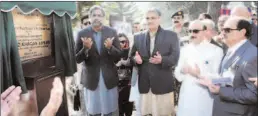  ?? MUZAFFARAB­AD
-APP ?? Prime Minister Shahid Khaqan Abbasi offering dua after unveiling plaque for inaugurati­on of Muzaffarab­ad to Pir Chinasi road.