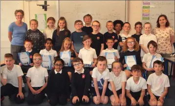  ??  ?? Star of the Sea Riverchape­l 3rd class pupils pictured with Maura Higgins, district gardener, Wexford County Council and class teacher Aisling McManus.