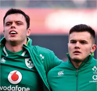 ?? DAVID FITZGERALD/SPORTSFILE ?? James Ryan, left, and Jacob Stockdale stand for the anthems before the Six Nations clash against Wales