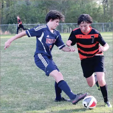  ??  ?? Heritage’s Jack Walther (left) tries to take the ball away from LaFayette’s Parker Lively during last week’s 4-0 Generals’ victory in south Walker County. (Catoosa County News photo/Scott Herpst) Ringgold 7, North Whitfield 5