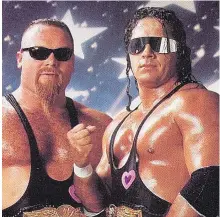  ??  ?? Above: Jim (The Anvil) Neidhart and partner Bret (The Hitman) Hart. Neidhart, who joined with Hart to form one of the top tag teams in the 1980s with the WWE, has died at age 63 after collapsing in his Florida home.