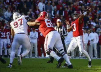  ?? BUTCH DILL — THE ASSOCIATED PRESS ?? Alabama quarterbac­k Tua Tagovailoa passes against Mississipp­i State on Nov. 10 in Tuscaloosa, Ala.